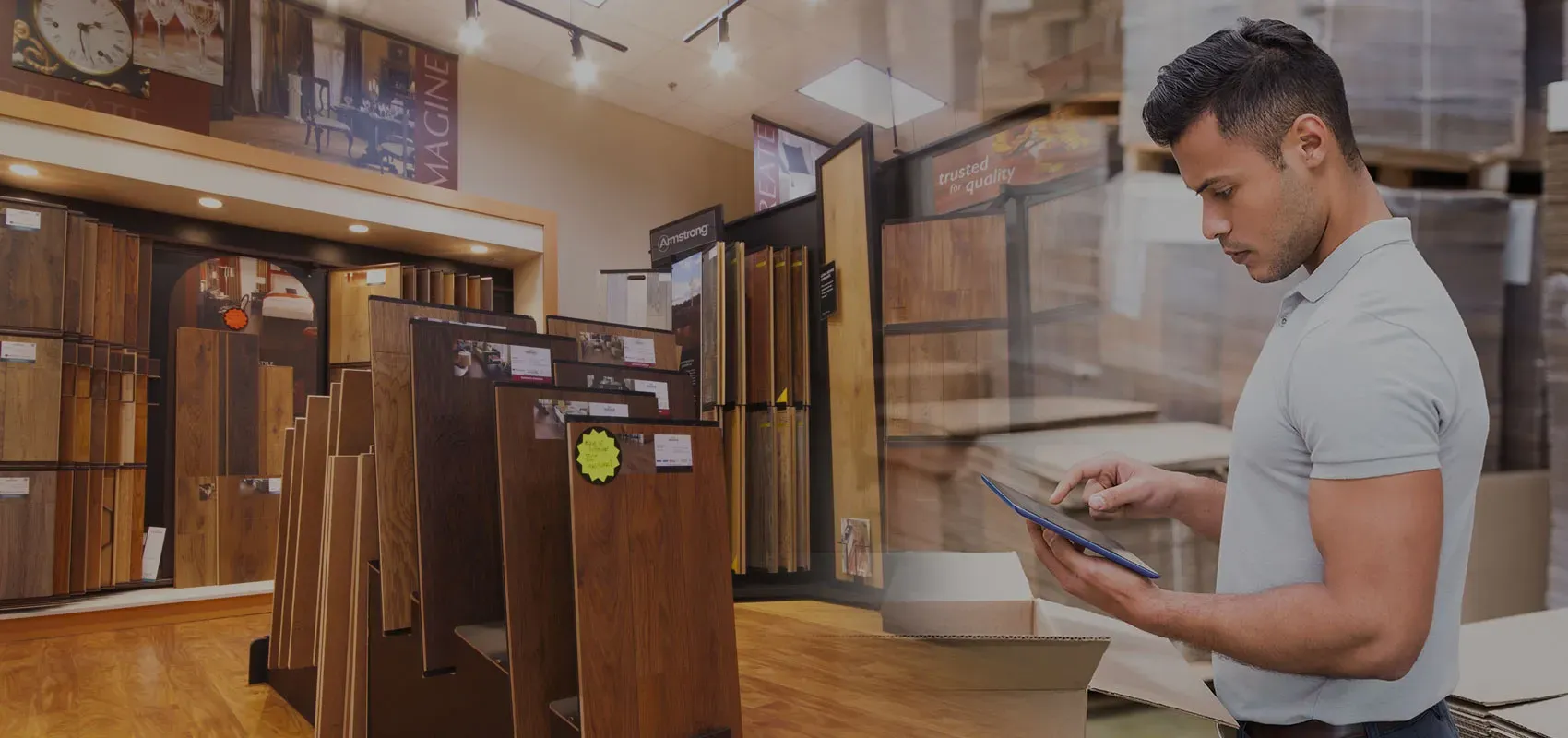 Contractor using tablet to access ERP benefits at flooring job site